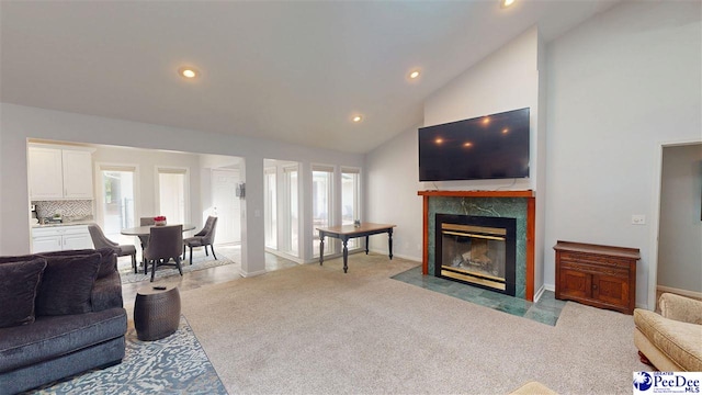1103 Pine Lake Dr, Hartsville, SC 29550 - carpeted living room with a fireplace, plenty of natural light, recessed lighting, and high vaulted ceiling