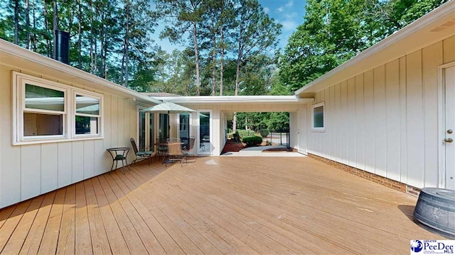 1103 Pine Lake Dr, Hartsville, SC 29550 - wooden terrace featuring view of wooded area