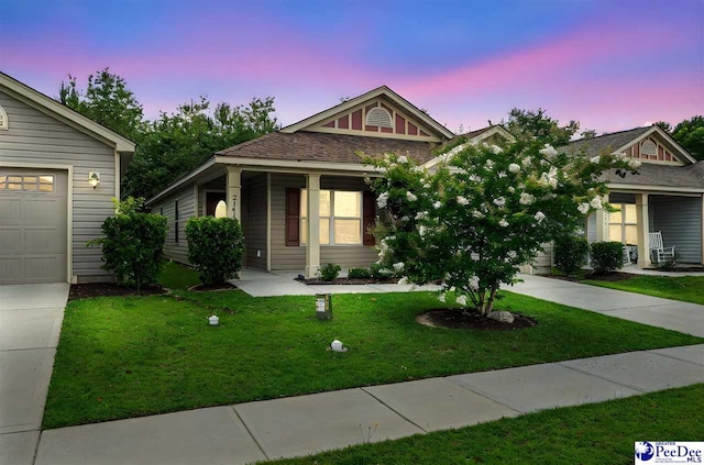 2141 Harbour Ln, Florence, SC 29505 - view of front of home with a front yard, driveway, and an attached garage