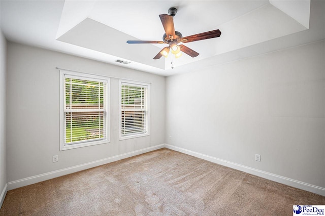 2141 Harbour Ln, Florence, SC 29505 - carpeted spare room featuring a ceiling fan and a raised ceiling
