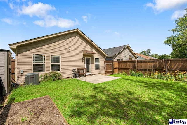 2141 Harbour Ln, Florence, SC 29505 - rear view of house featuring a fenced backyard and a patio area