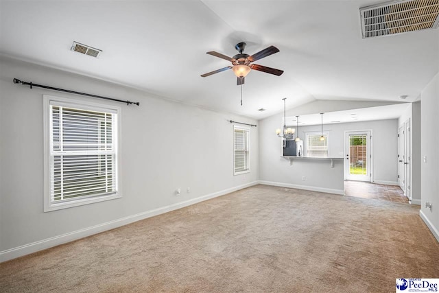2141 Harbour Ln, Florence, SC 29505 - unfurnished living room with a ceiling fan, light colored carpet, and lofted ceiling