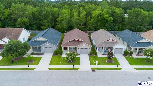 2141 Harbour Ln, Florence, SC 29505 - aerial view of property and surrounding area with a heavily wooded area
