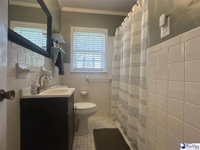 412 W Greene St, Cheraw, SC 29520 - bathroom featuring tile walls, vanity, healthy amount of natural light, tile patterned floors, and curtained shower