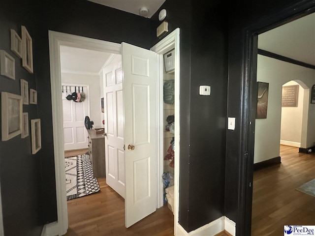 412 W Greene St, Cheraw, SC 29520 - hall with wood finished floors, arched walkways, and crown molding