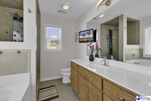 full bath featuring a healthy amount of sunlight, visible vents, vanity, and tile patterned floors