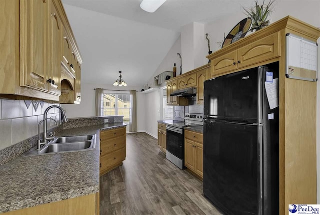 kitchen with decorative backsplash, electric stove, freestanding refrigerator, under cabinet range hood, and a sink