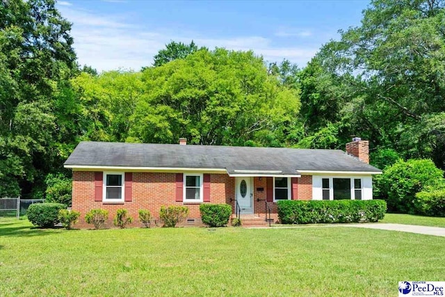 317 Thomas St, Bennettsville, SC 29512 - ranch-style house with a chimney, crawl space, and brick siding