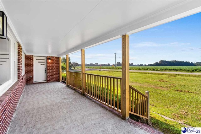 view of patio / terrace featuring a rural view