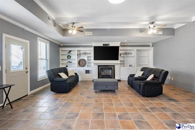 living room with visible vents and ornamental molding