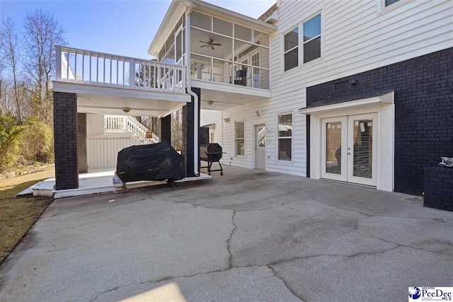 view of patio featuring stairs, area for grilling, french doors, and a ceiling fan