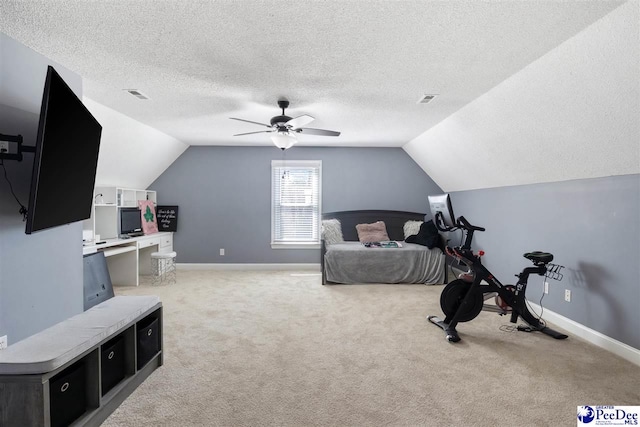 bedroom featuring light carpet, visible vents, and lofted ceiling