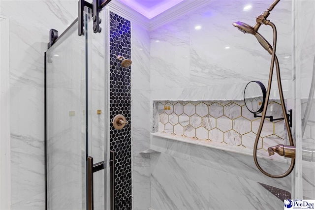 bathroom featuring a marble finish shower and crown molding