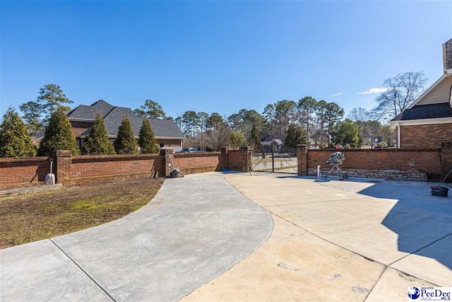 exterior space featuring a gate and fence