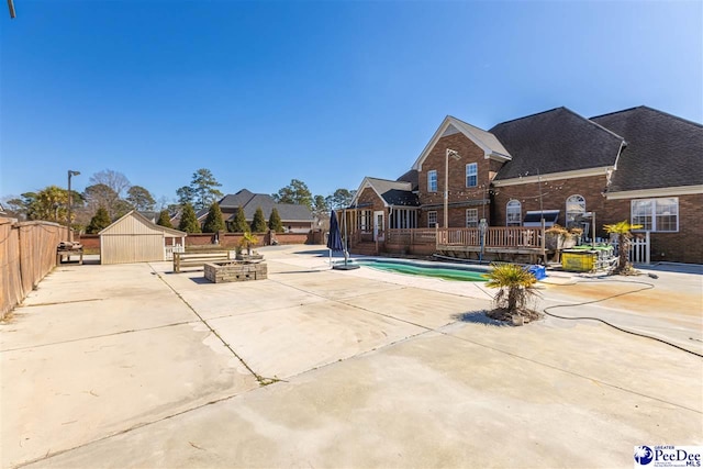 view of swimming pool with fence and a fenced in pool