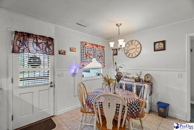106 Min Lou Cir, Darlington, SC 29532 - dining room featuring light tile patterned flooring, ornamental molding, and a chandelier