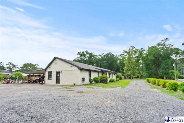 106 Min Lou Cir, Darlington, SC 29532 - view of property exterior with driveway and a carport