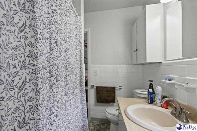 106 Min Lou Cir, Darlington, SC 29532 - full bathroom with toilet, vanity, tile walls, a shower with curtain, and wainscoting