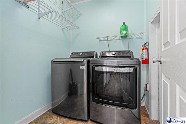 laundry room featuring independent washer and dryer