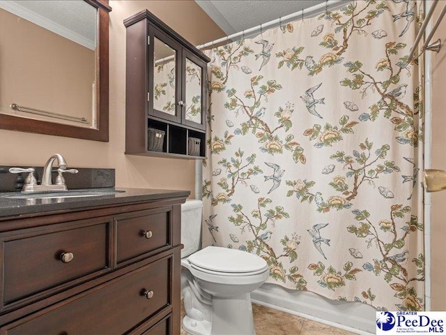 bathroom with a textured ceiling, crown molding, shower / bath combo with shower curtain, toilet, and vanity