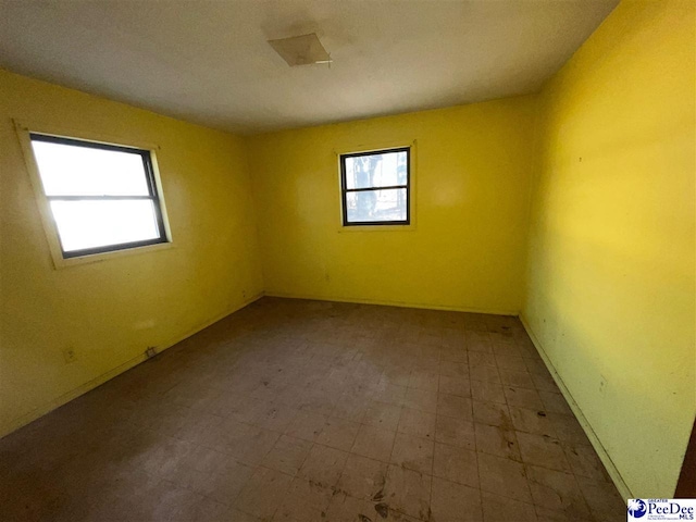 spare room featuring tile patterned floors