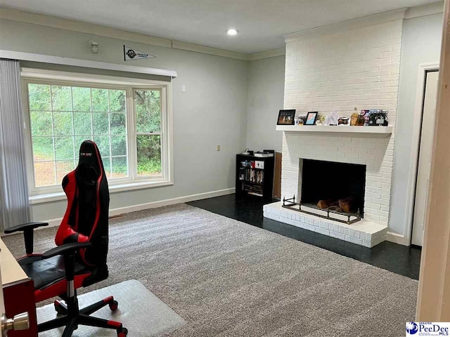 office with ornamental molding, recessed lighting, a fireplace, and baseboards