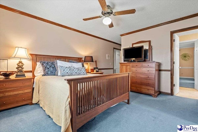 bedroom featuring a ceiling fan, a textured ceiling, carpet, crown molding, and vaulted ceiling