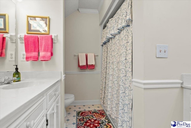 bathroom featuring curtained shower, baseboards, toilet, vanity, and a textured ceiling