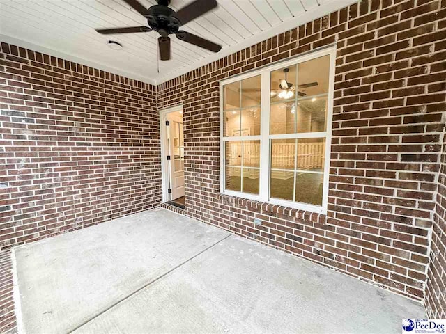 view of patio featuring ceiling fan