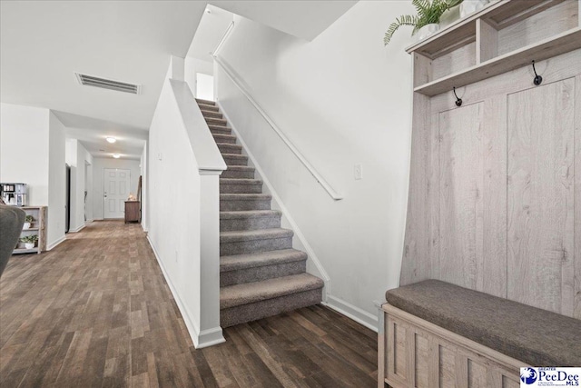 4080 Lake Russell Dr, Florence, SC 29501 - stairs with visible vents, baseboards, and wood finished floors