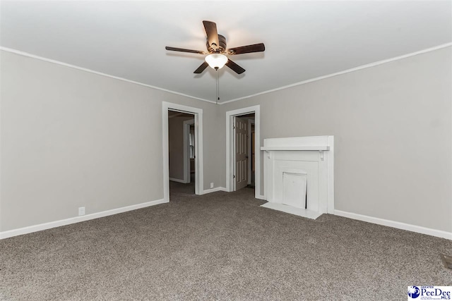 interior space featuring crown molding, carpet floors, and ceiling fan