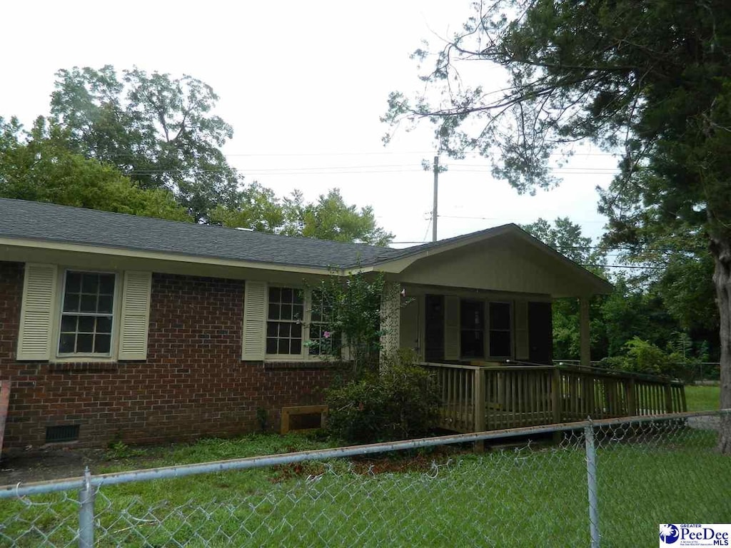 exterior space featuring a front lawn