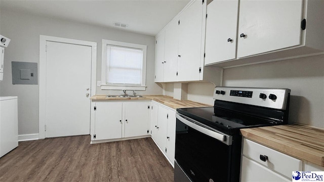 kitchen featuring white cabinetry, wood-type flooring, sink, stainless steel range with electric cooktop, and electric panel