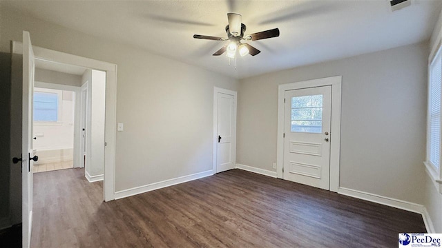 entrance foyer featuring dark hardwood / wood-style floors and ceiling fan