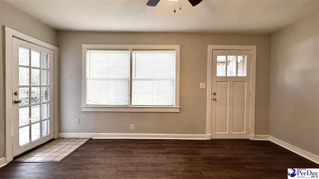 entrance foyer with ceiling fan and dark hardwood / wood-style flooring