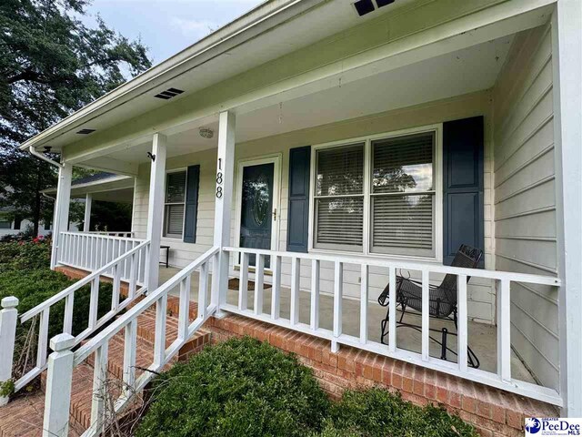 188 Chatham Trace Cir, Cheraw, SC 29520 - view of exterior entry with covered porch