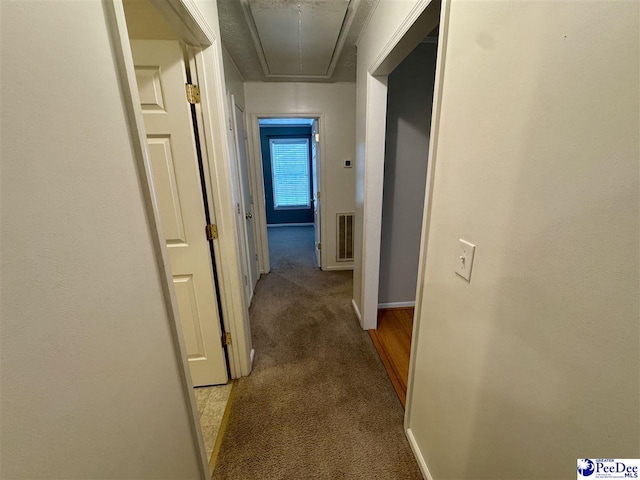 188 Chatham Trace Cir, Cheraw, SC 29520 - hallway featuring attic access and light carpet