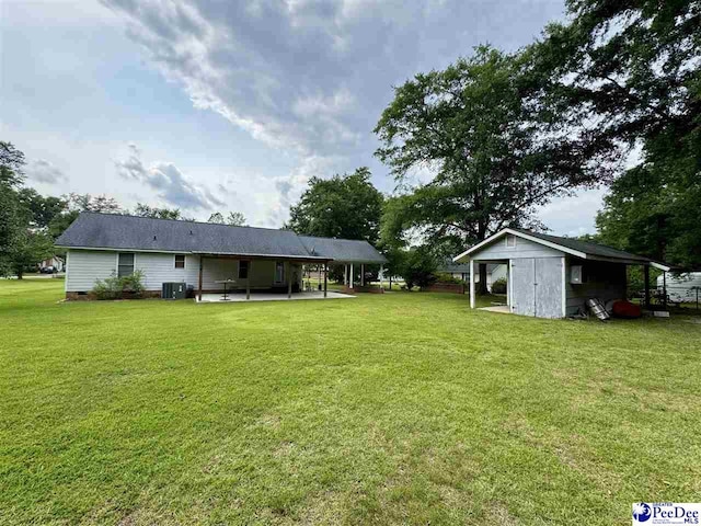 188 Chatham Trace Cir, Cheraw, SC 29520 - rear view of house with a patio area, a lawn, a shed, and crawl space