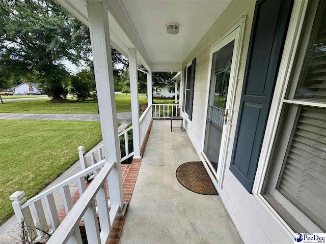 188 Chatham Trace Cir, Cheraw, SC 29520 - covered porch featuring a yard