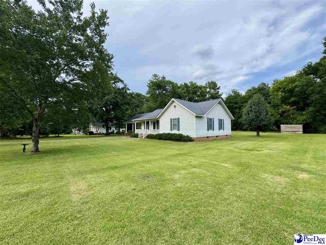 188 Chatham Trace Cir, Cheraw, SC 29520 - view of side of home featuring a lawn and crawl space