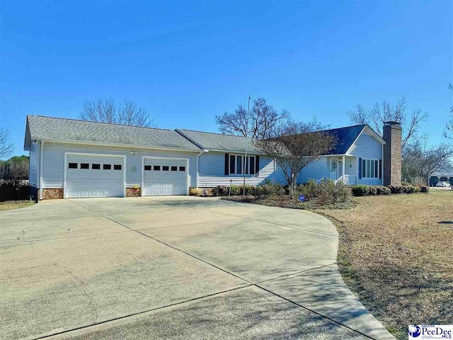 single story home with a garage