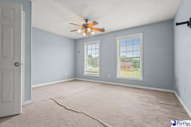 2770 Gray Dr, Darlington, SC 29532 - carpeted empty room with ceiling fan and a textured ceiling