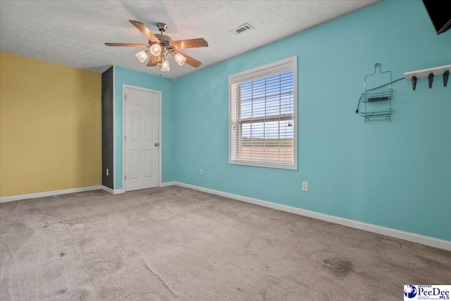 2770 Gray Dr, Darlington, SC 29532 - carpeted spare room with a ceiling fan and a textured ceiling