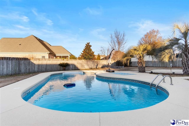 view of pool with a patio area