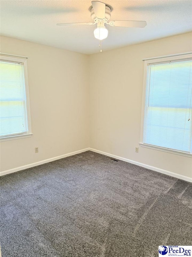 1801 E Howe Springs Rd, Florence, SC 29505 - carpeted spare room featuring a ceiling fan and baseboards