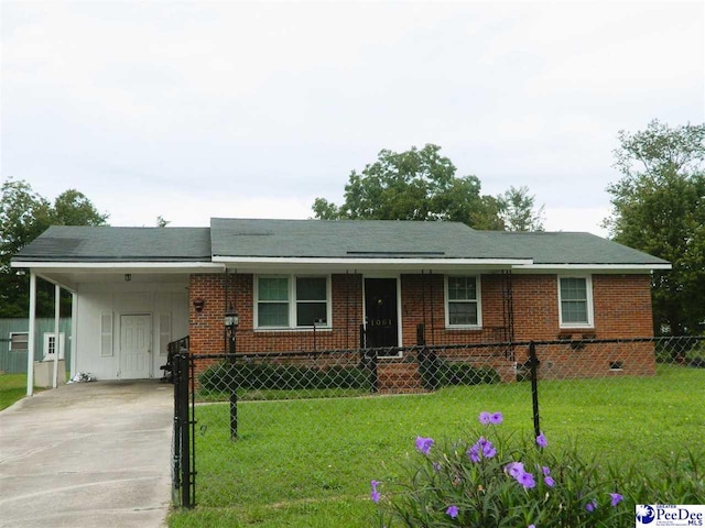 ranch-style home with a carport and a front lawn