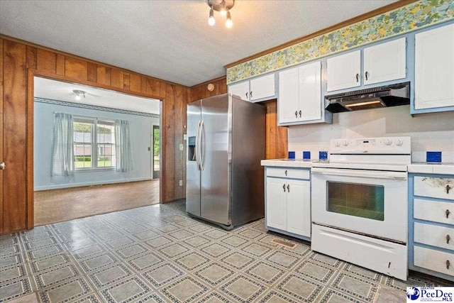 1216 Arrowood Dr, Florence, SC 29501 - kitchen with stainless steel fridge with ice dispenser, white electric range, under cabinet range hood, light countertops, and white cabinets