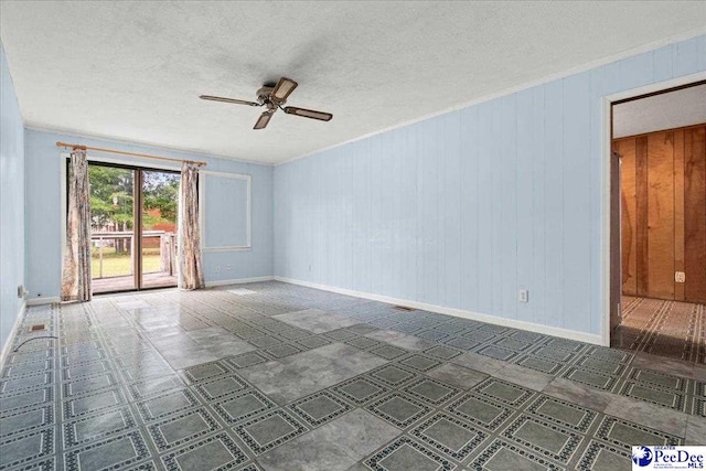 1216 Arrowood Dr, Florence, SC 29501 - empty room featuring baseboards, a ceiling fan, a textured ceiling, and crown molding