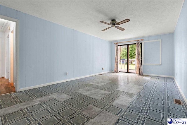 1216 Arrowood Dr, Florence, SC 29501 - empty room featuring ceiling fan, baseboards, attic access, and a textured ceiling