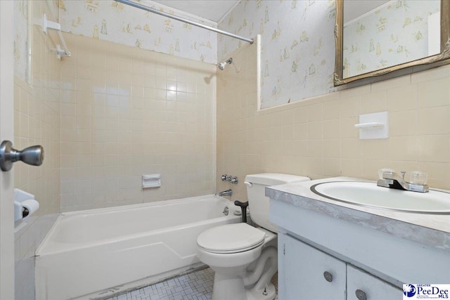 1216 Arrowood Dr, Florence, SC 29501 - bathroom with tile walls, toilet, bathing tub / shower combination, wallpapered walls, and vanity